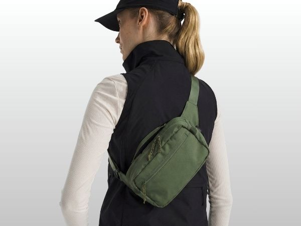 SUSU Grab & Go worn as crossbody sling bag — adjustable strap fits 4 to 50 inches