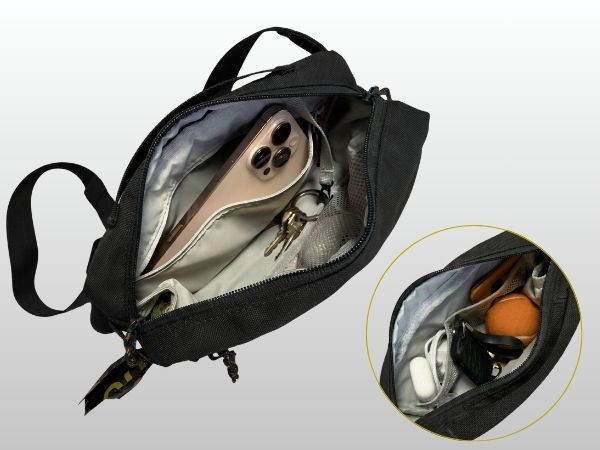 Inside view of SUSU Grab & Go dog walking bag — organized pockets for phone and keys