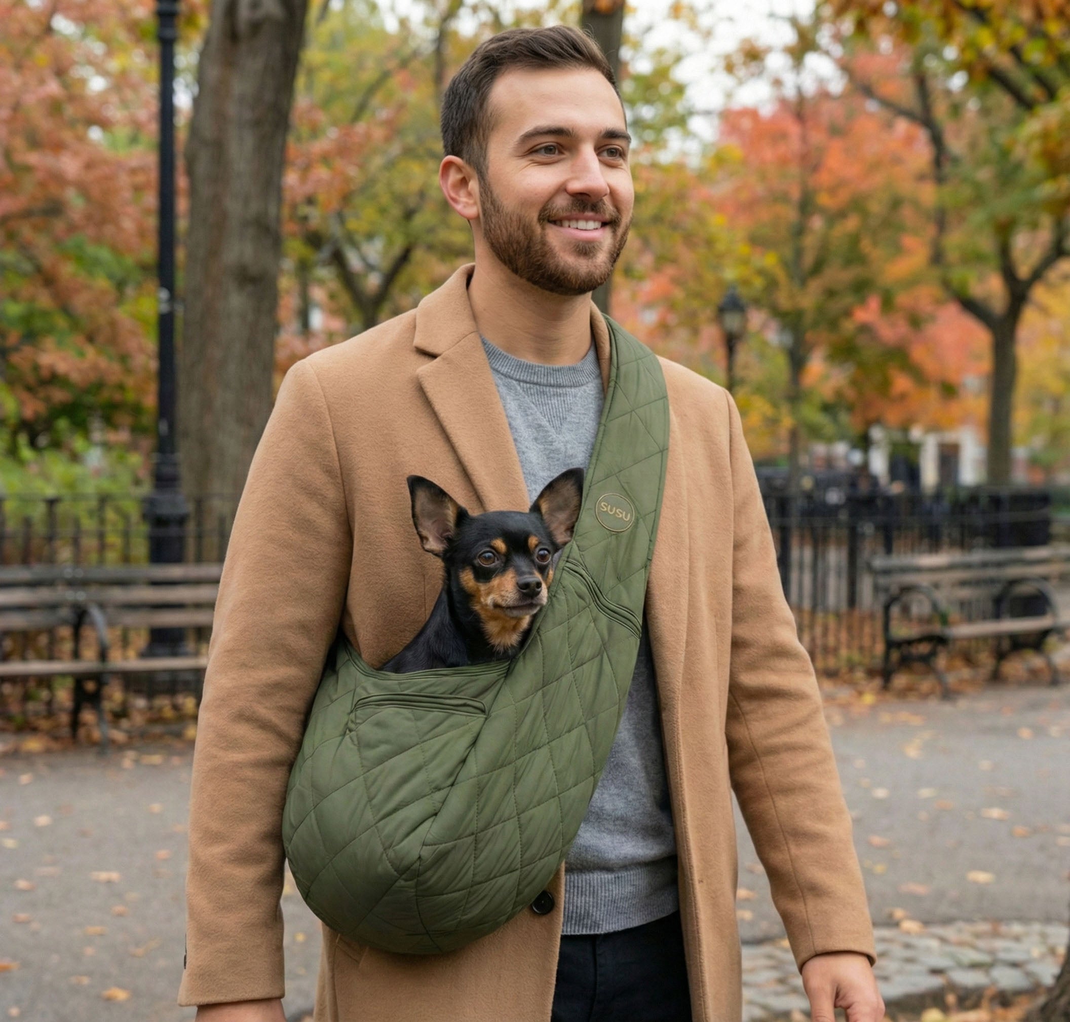 Maltese in cream SUSU sling carrier for weekend hiking and outdoor trail walks